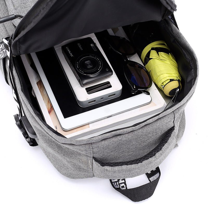 Waterproof Oxford laptop backpack with USB charging port, ideal for travel and daily use