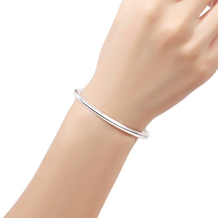 "Pure 9999 Silver Glossy Bracelet | Simple Round Bar Design"